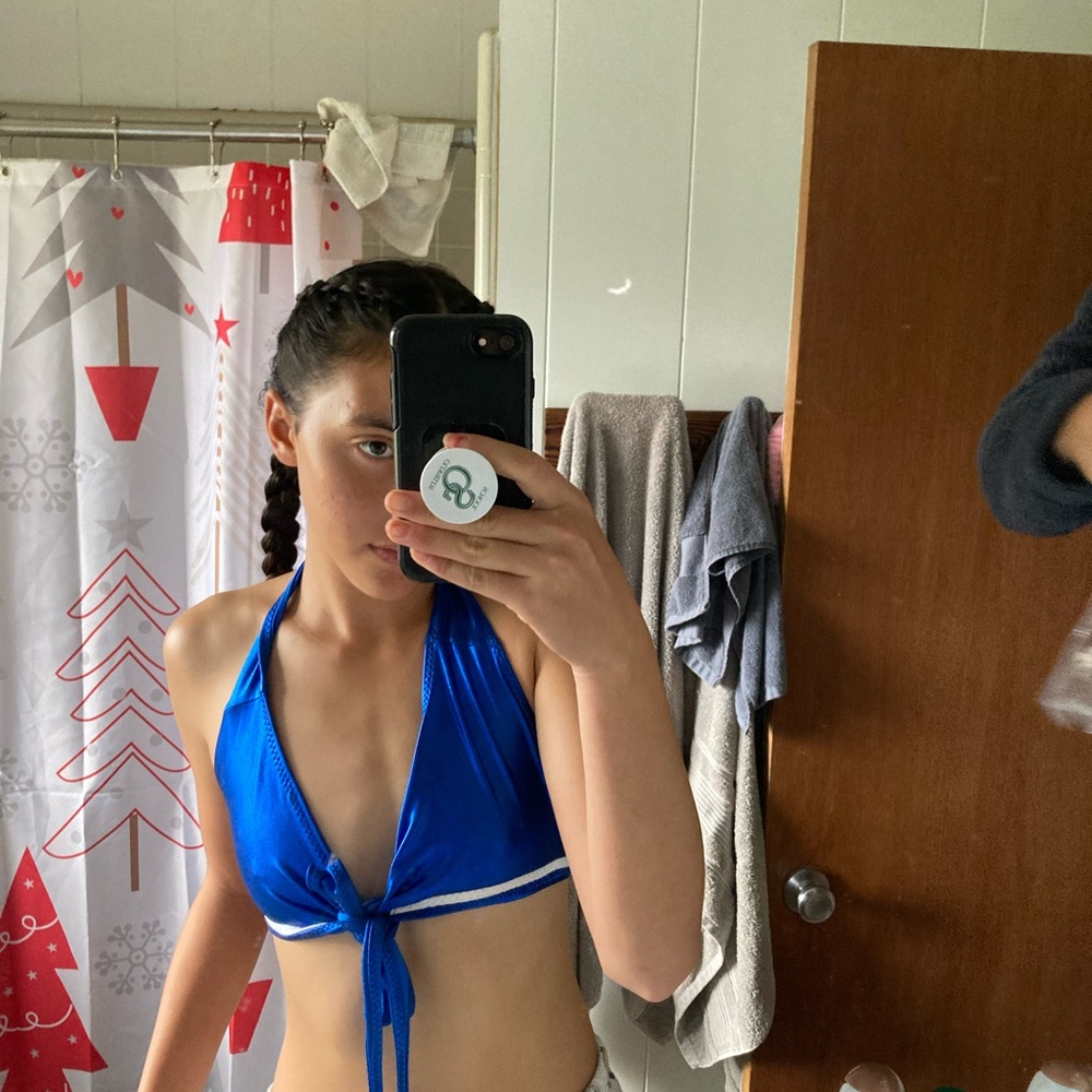 Shinny blue halter top with matching low rise blue shorts set